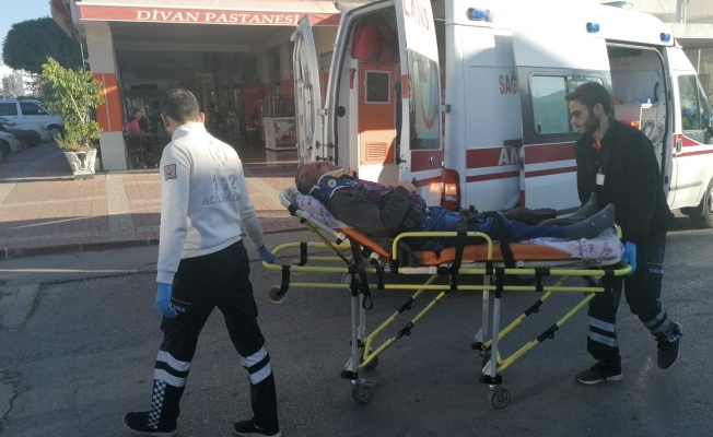 Geri manevra yapan kargo aracının altında kalan vatandaş yaraladı