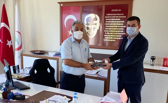 Türkdoğan’dan hem ziyaret hem hediye